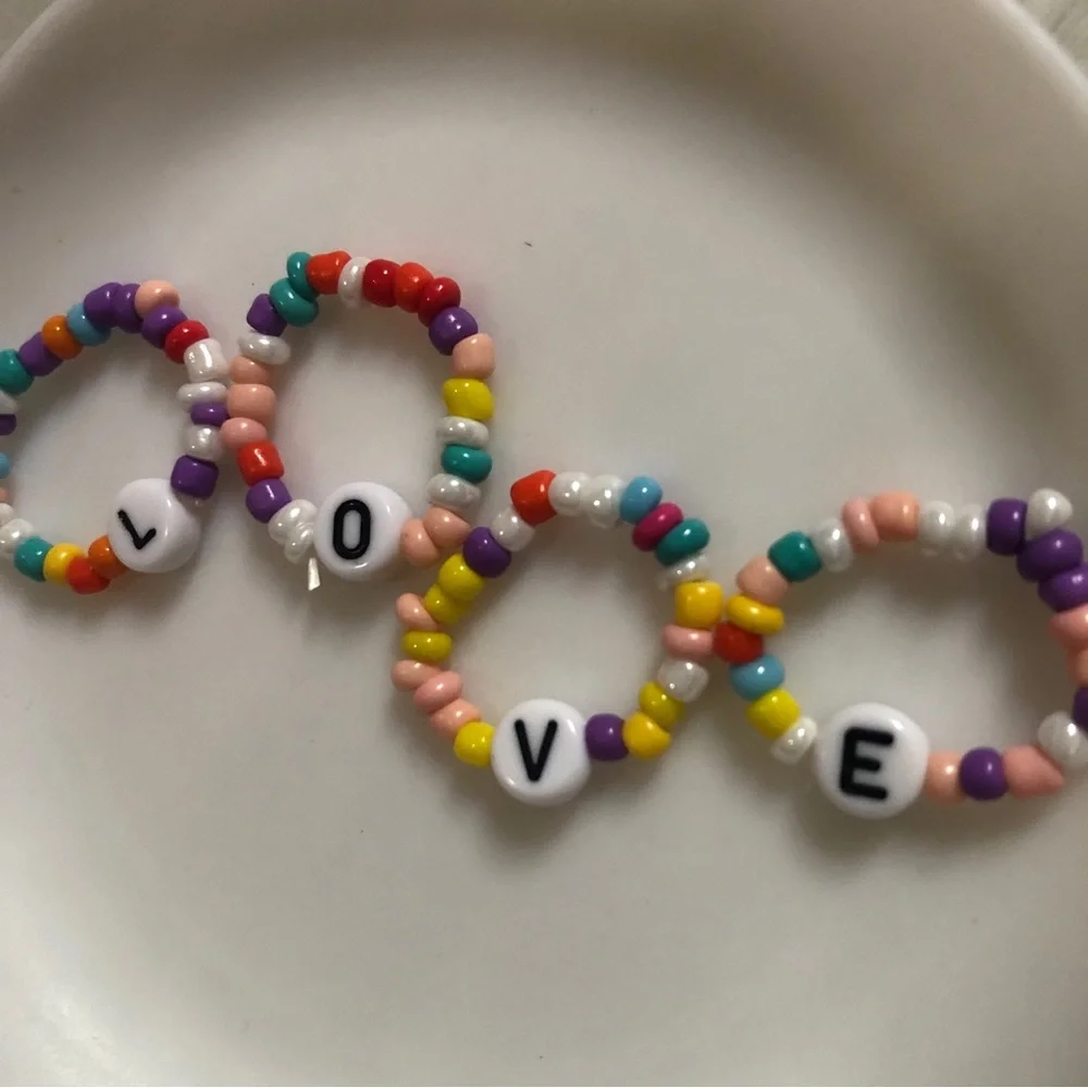 Four beaded LOVE rings